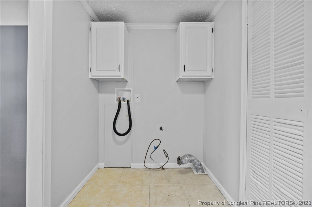 287 Doyle Cox Road Sanford, NC 27330 - Photo 24 of 35 a bathroom with white bath tub and shower