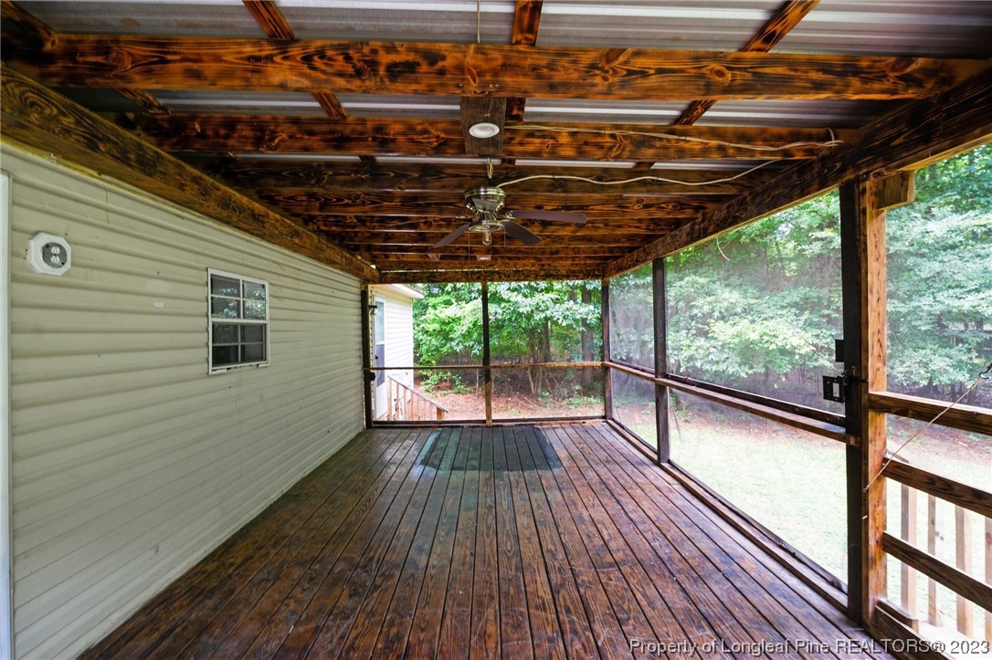287 Doyle Cox Road Sanford, NC 27330 - Photo 32 of 35 a view of outdoor space with wooden floor