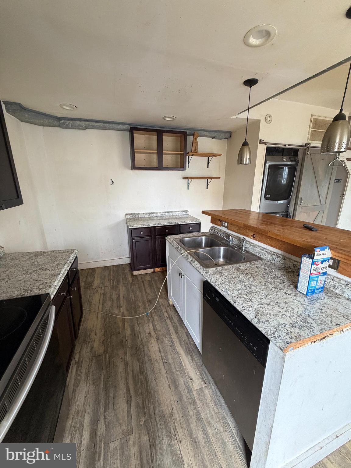5700 Kingsessing Avenue Philadelphia, PA 19143 - Photo 9 of 18 a kitchen with stainless steel appliances granite countertop a stove and a sink