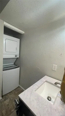 a bathroom with a sink and toilet