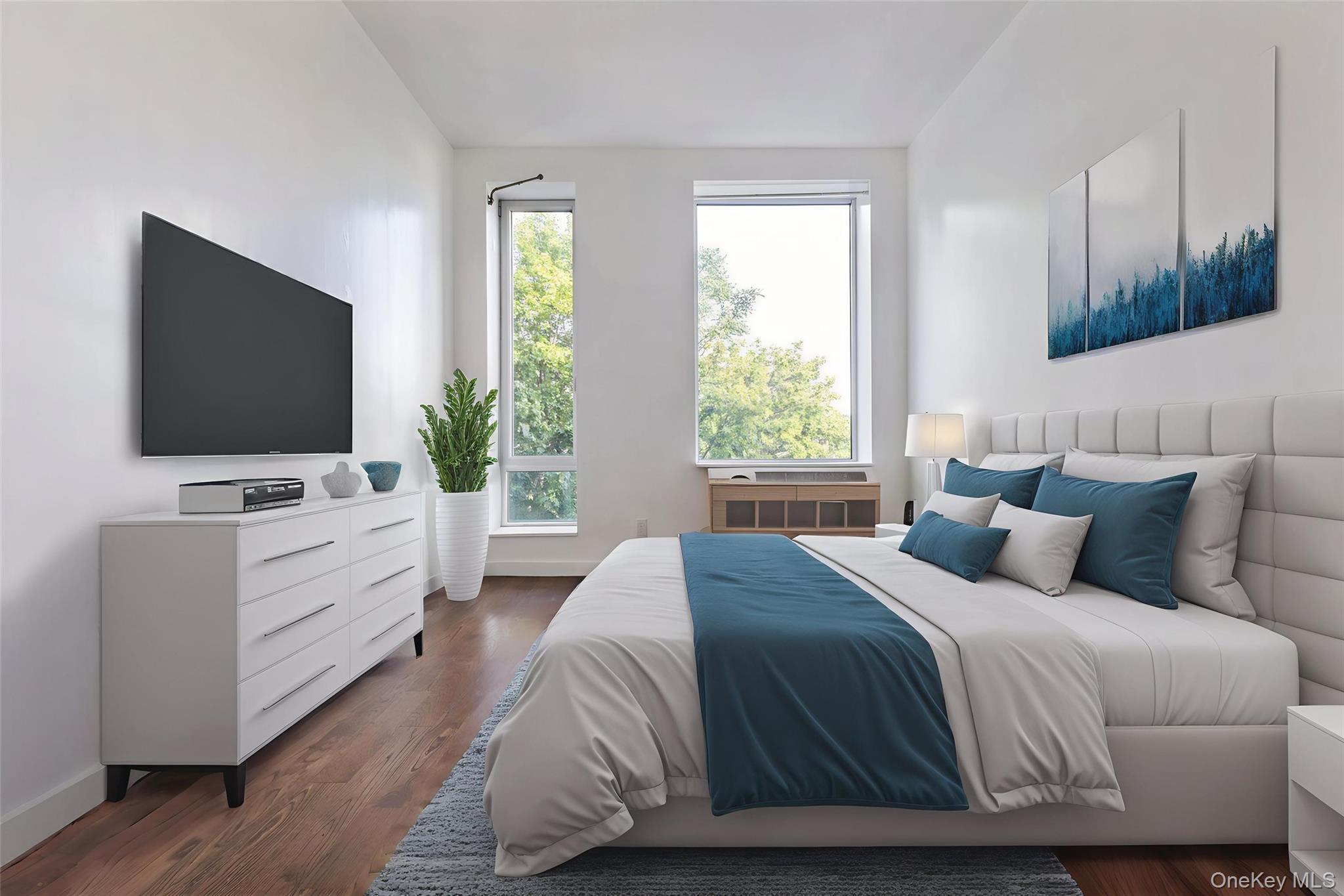 111 Monroe Street, Unit 4F Brooklyn, NY 11216 - Photo 15 of 25 Ample Bedroom setting with wood floors