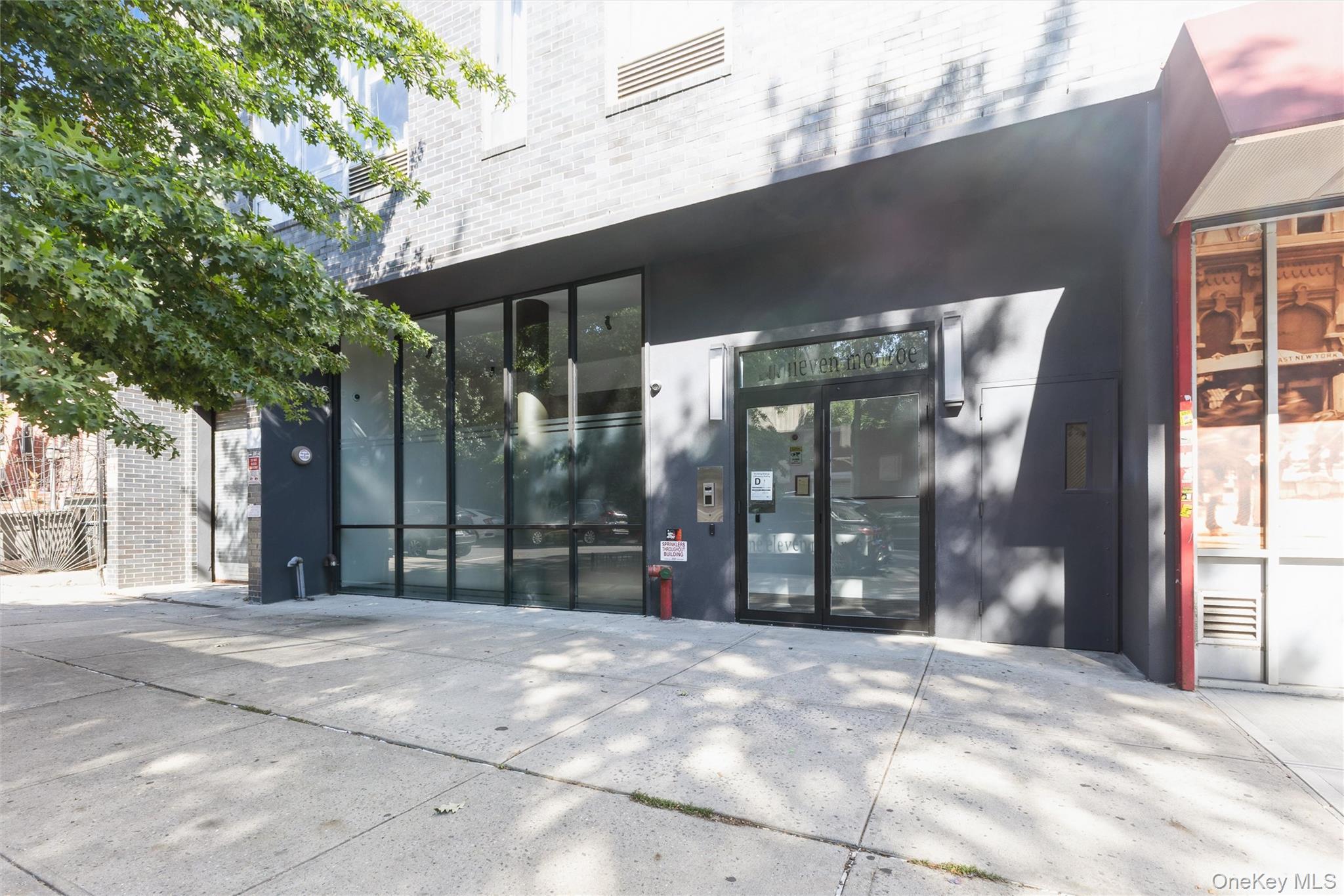 111 Monroe Street, Unit 4F Brooklyn, NY 11216 - Photo 24 of 25 Doorway to property featuring stucco & brick facade