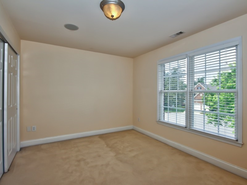 9612 Heathermill Lane Raleigh, NC 27617 - Photo 17 of 25 a view of a livingroom with a window