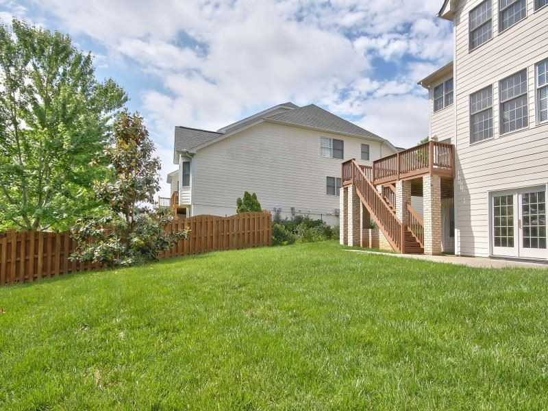 9612 Heathermill Lane Raleigh, NC 27617 - Photo 25 of 25 a view of a house with backyard and garden