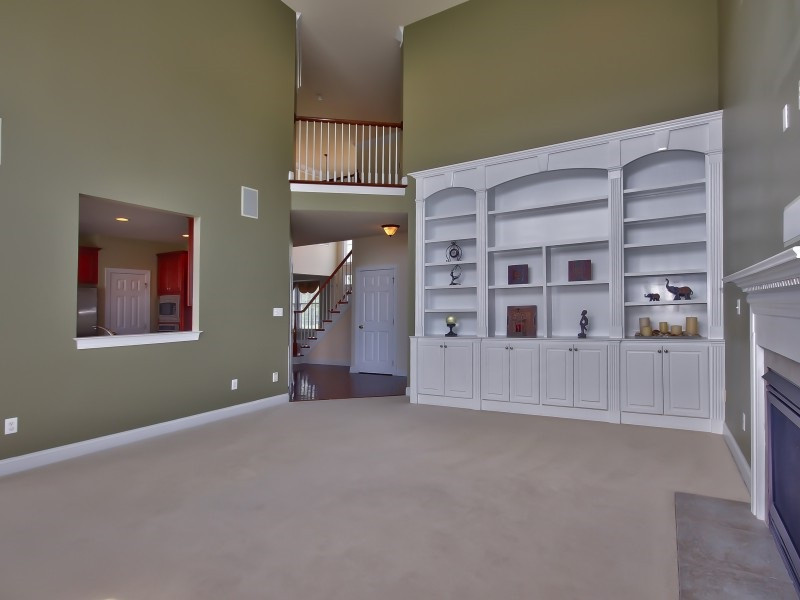 9612 Heathermill Lane Raleigh, NC 27617 - Photo 9 of 25 a view of an empty room with window and wardrobe
