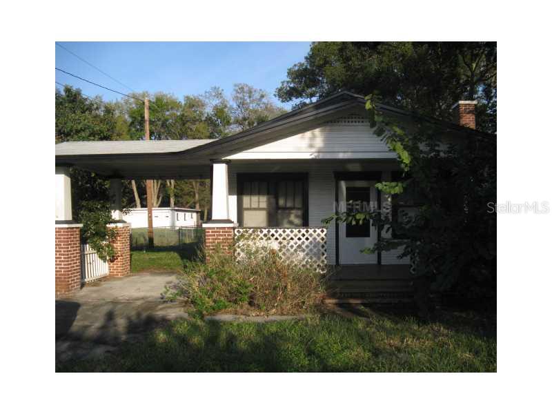 1101 North Combee Road Lakeland, FL 33801 - Photo 1 of 1 a view of a house with porch and garden