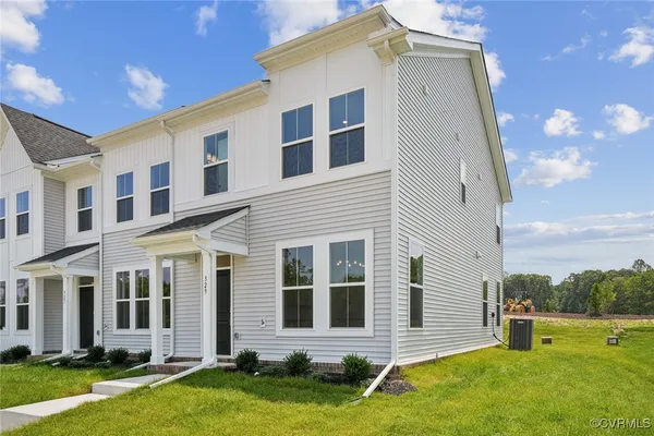 front view of a house with a yard