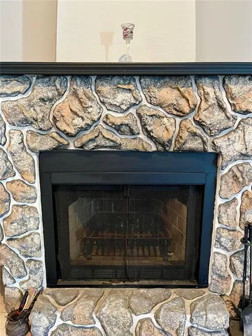 a view of wooden floor with a fireplace