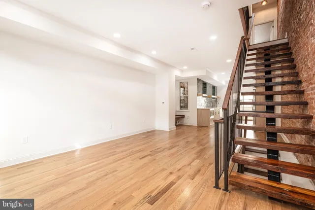 a view of entryway with wooden floor