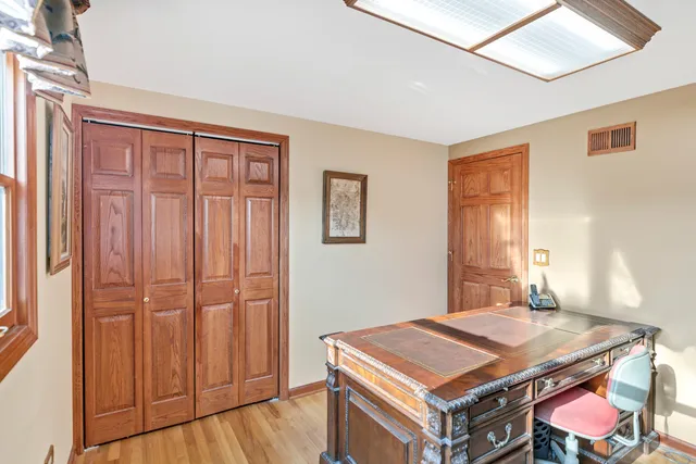 a view of yard with grass and trees