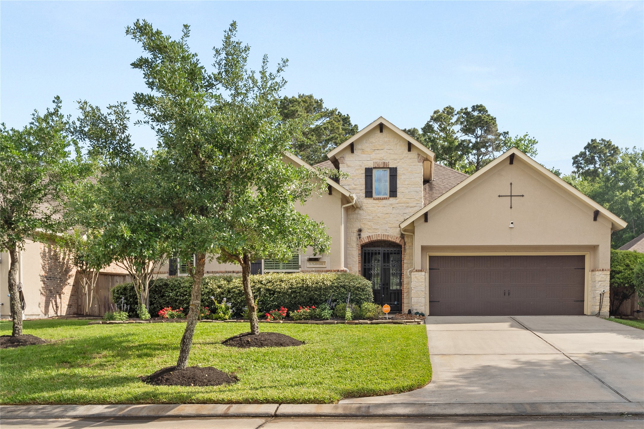 19813 Cullen Ridge Drive Porter, TX 77365 - Photo 1 of 44 Welcome to 19813 Cullen Ridge, a charming, beautifully landscaped home with a welcoming stone façade and spacious two-car garage, nestled at the end of a cul-de-sac.