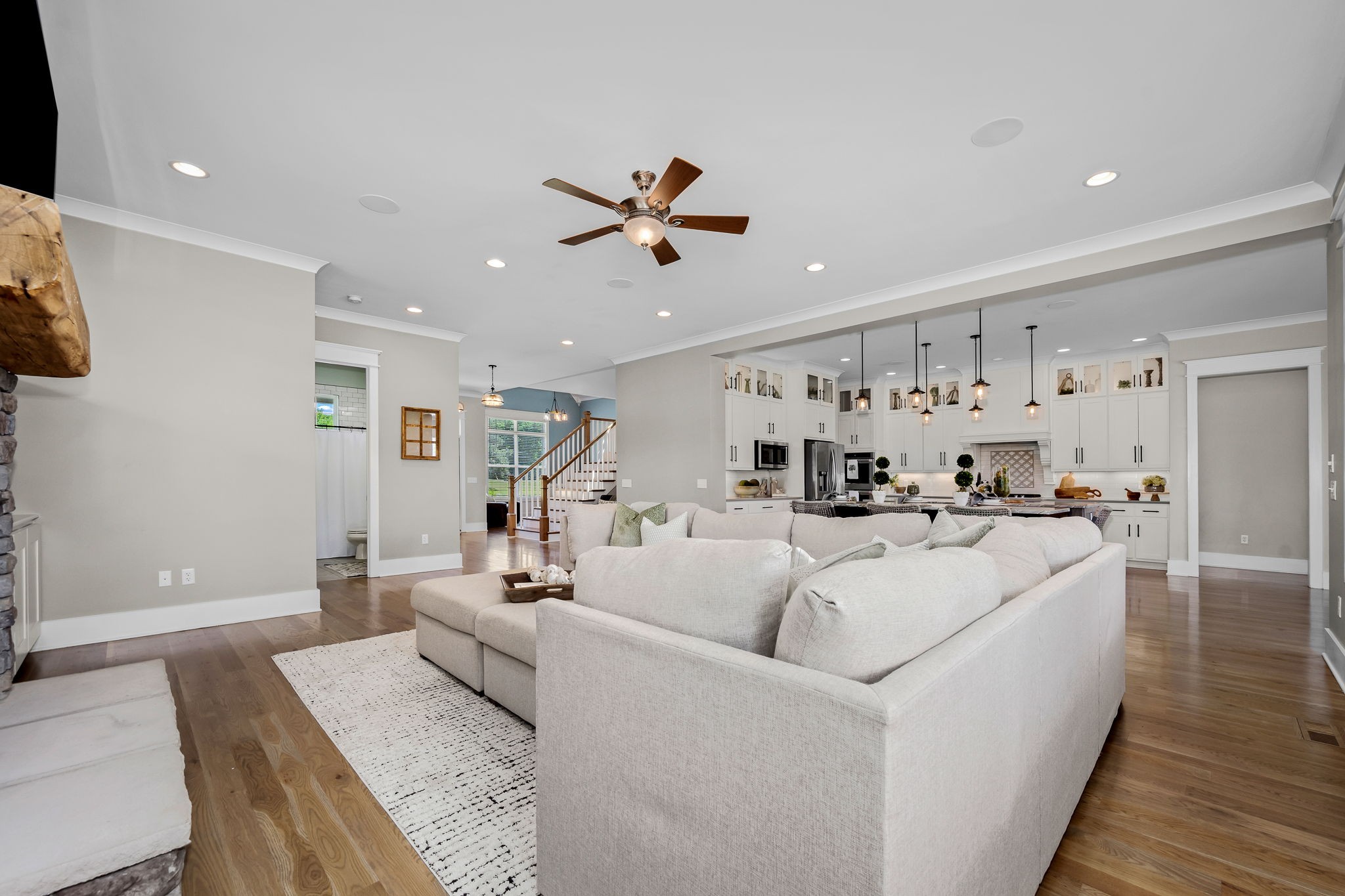 12365 Hogwood Road Milton, TN 37118 - Photo 12 of 59 a living room with furniture and a chandelier