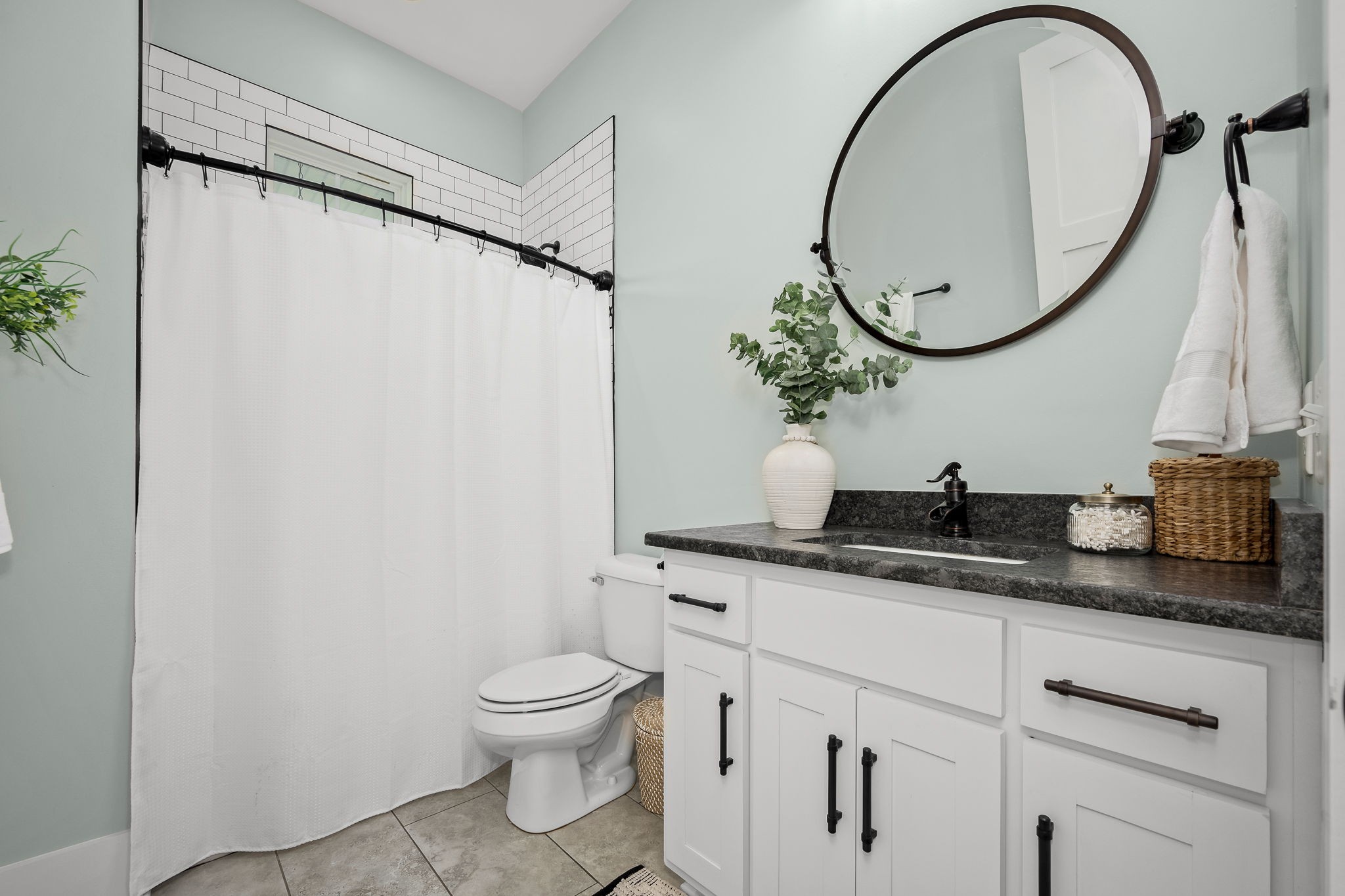 12365 Hogwood Road Milton, TN 37118 - Photo 29 of 59 a bathroom with a granite countertop sink a toilet and a mirror