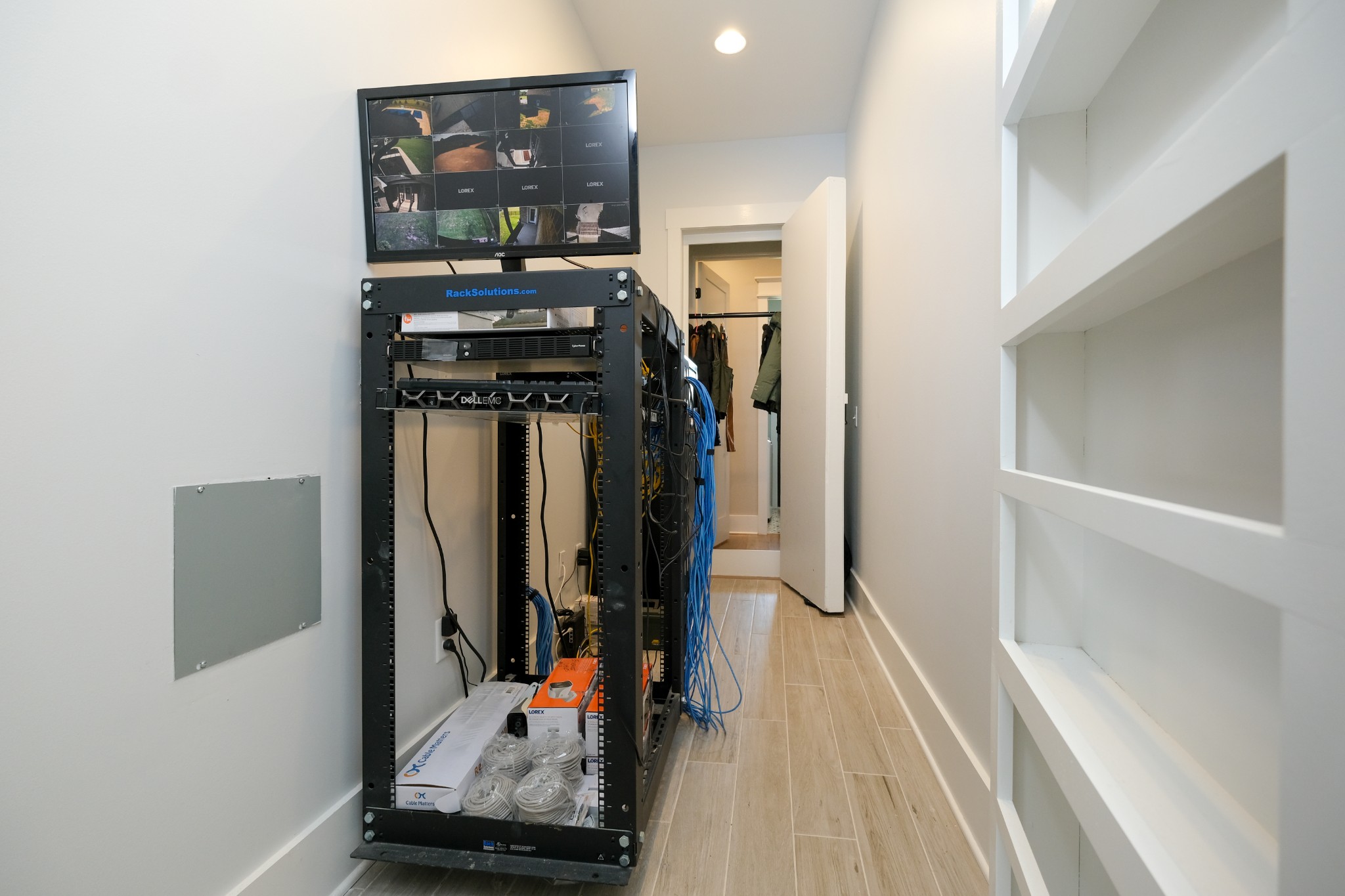 12365 Hogwood Road Milton, TN 37118 - Photo 31 of 59 a view of a hallway with wooden floor and workspace