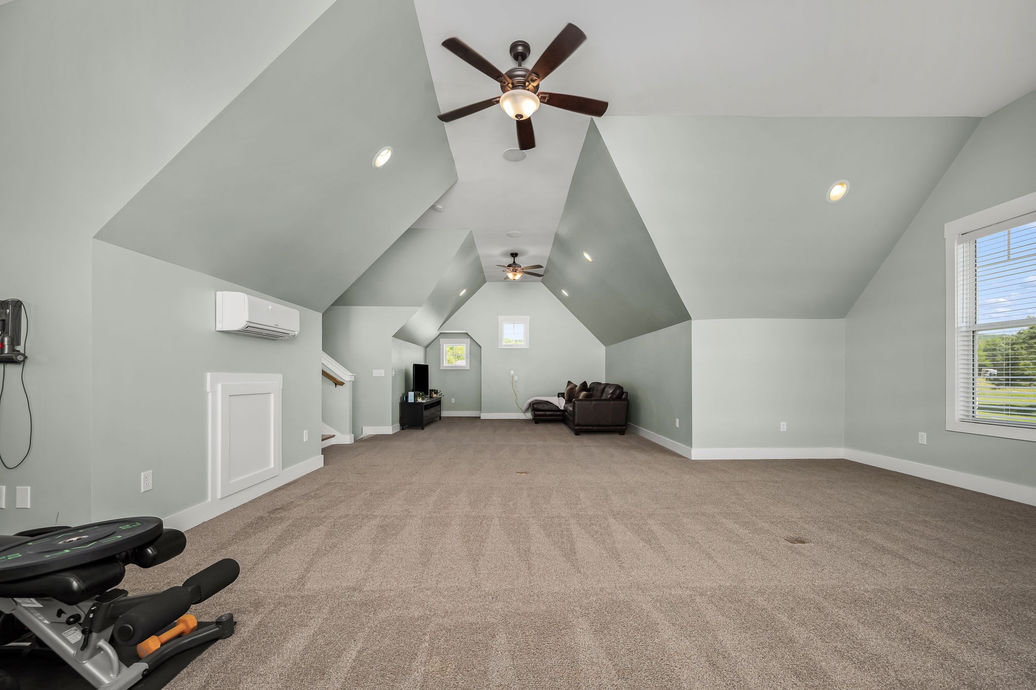 12365 Hogwood Road Milton, TN 37118 - Photo 35 of 59 a view of a livingroom with a ceiling fan and window