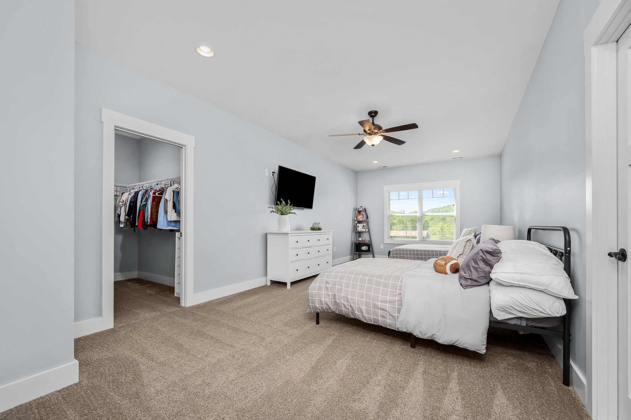 12365 Hogwood Road Milton, TN 37118 - Photo 40 of 59 a bedroom with bed tv and a window