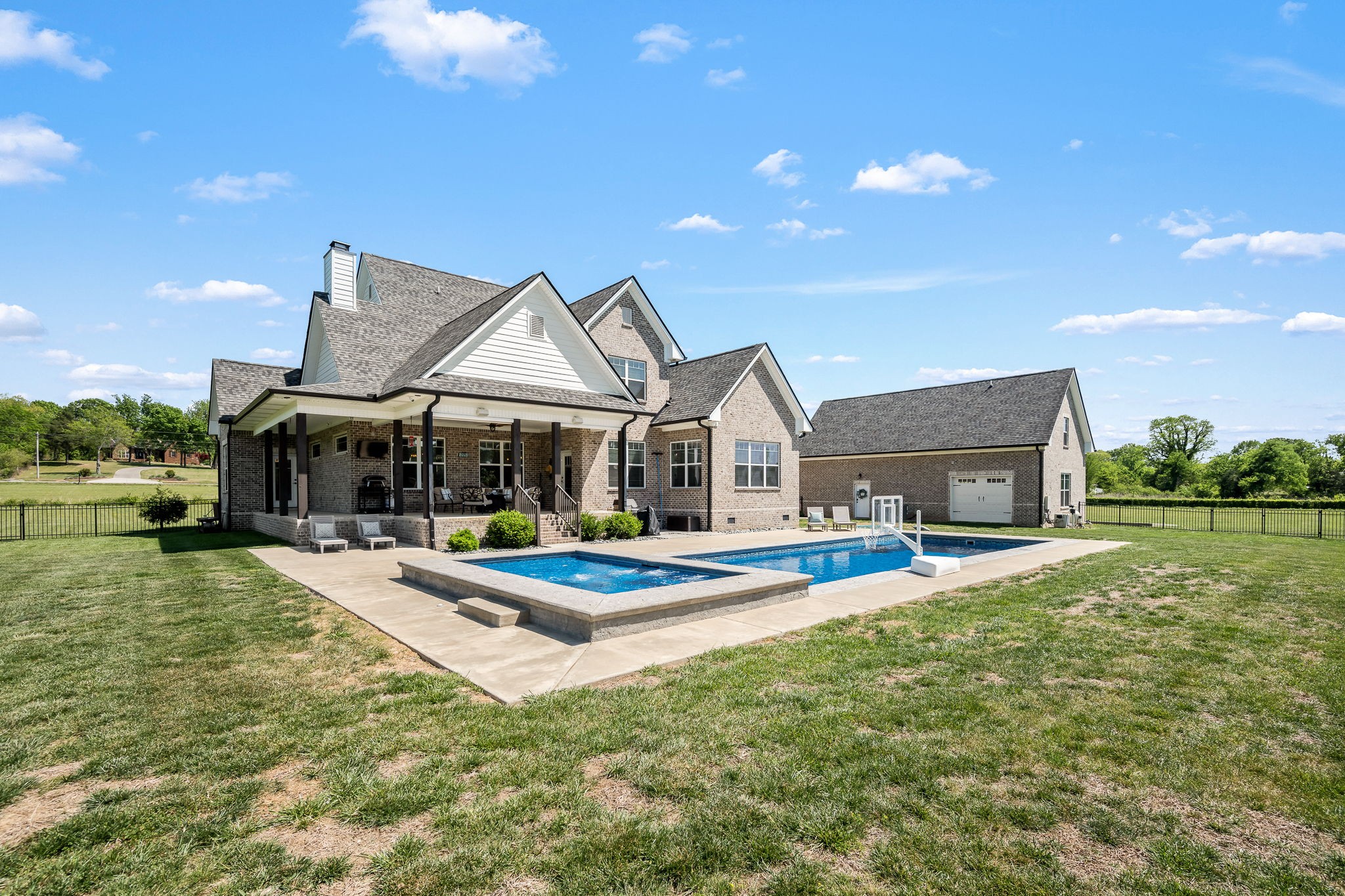 12365 Hogwood Road Milton, TN 37118 - Photo 53 of 59 a view of house with outdoor space and swimming pool