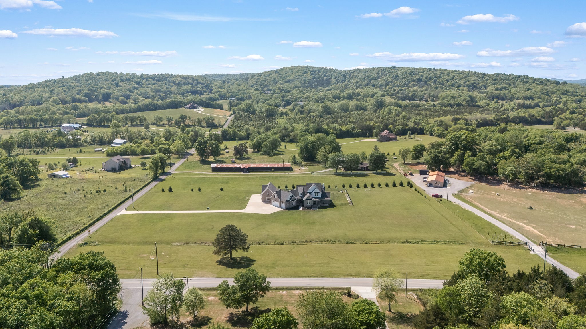 12365 Hogwood Road Milton, TN 37118 - Photo 59 of 59 an aerial view of residential houses with outdoor space