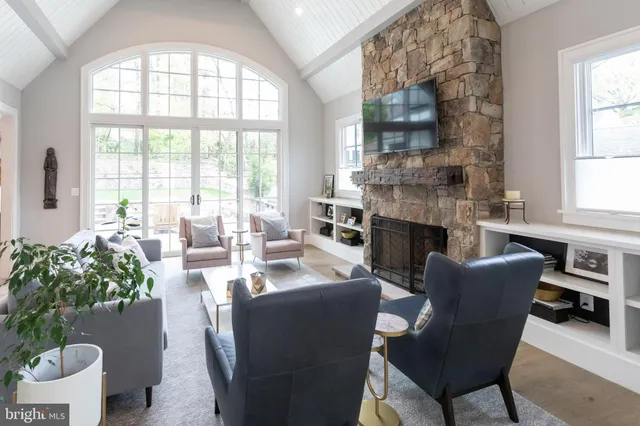 a view of a dining room with furniture and window
