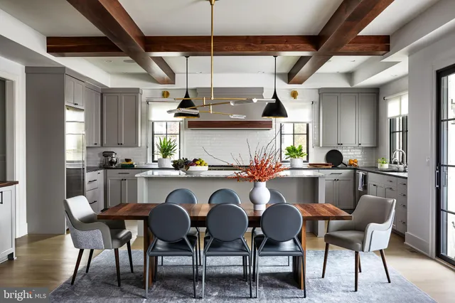 a spacious bathroom with a double vanity sink a mirror and a bathtub
