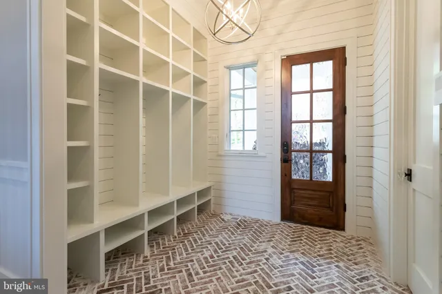a dining room with wooden floor and dining table