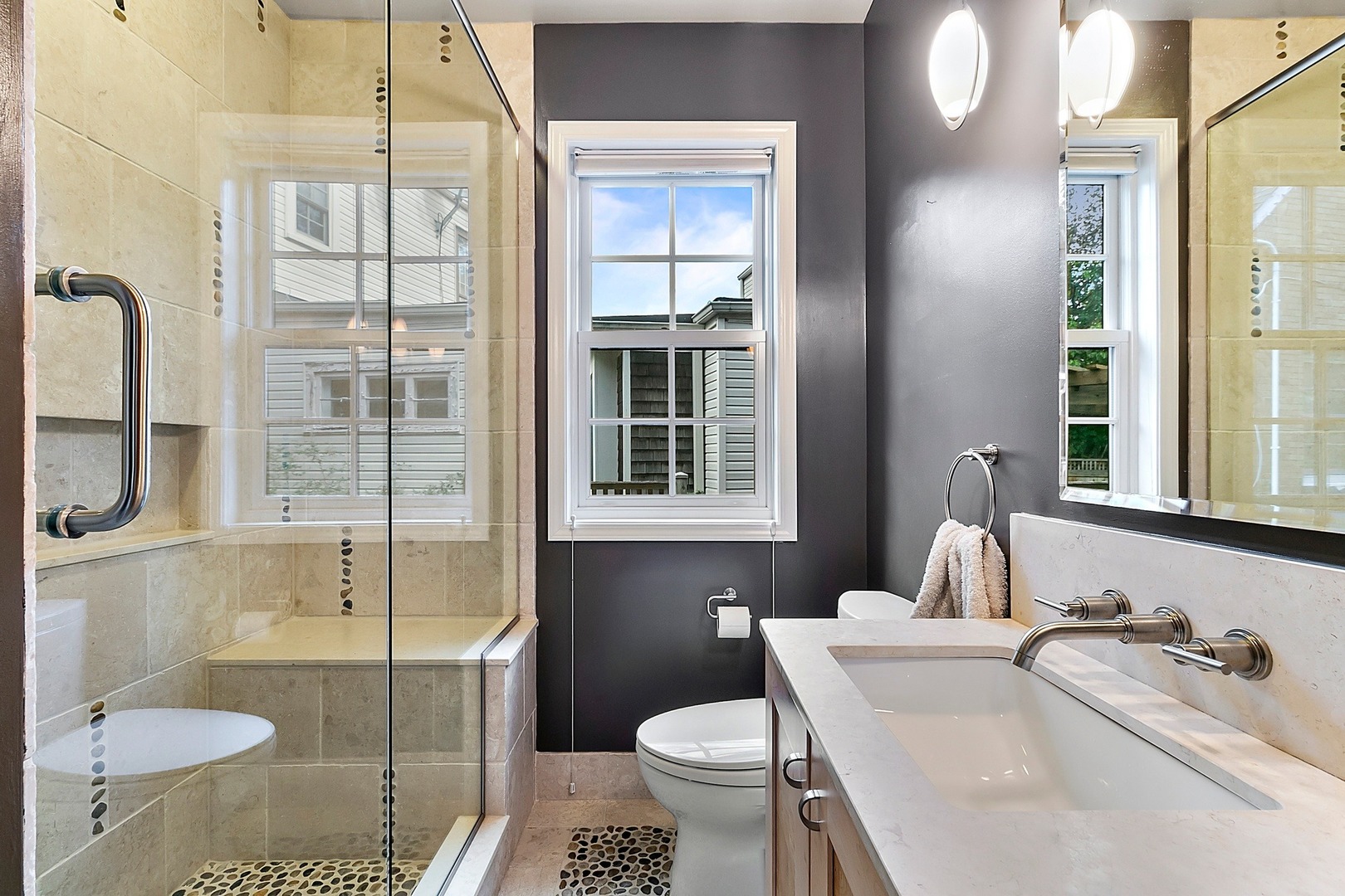595 Selborne Road Riverside, IL 60546 - Photo 11 of 25 a bathroom with a sink toilet and shower