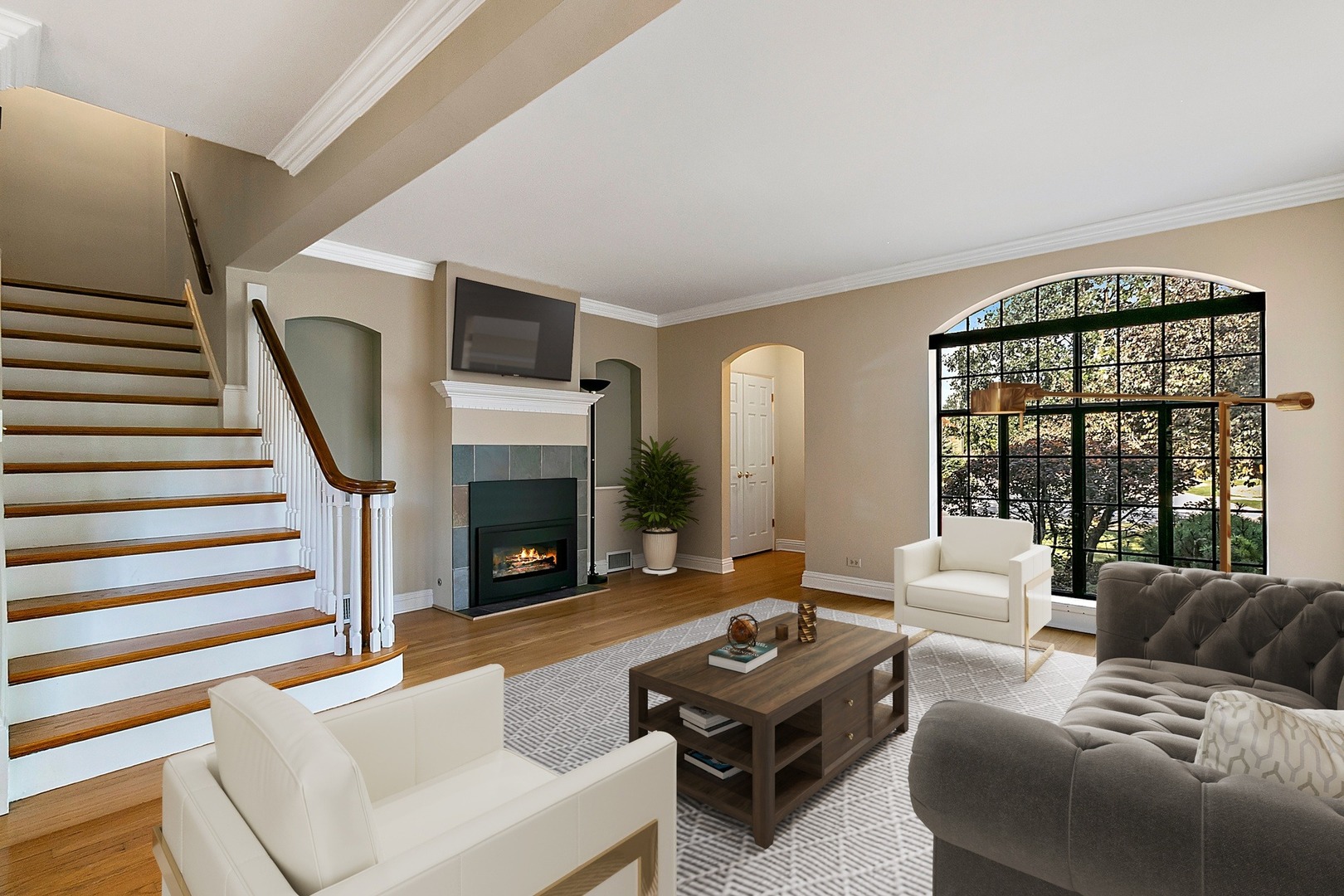 595 Selborne Road Riverside, IL 60546 - Photo 3 of 25 a living room with furniture fireplace and a large window