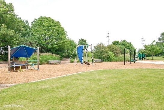 595 Selborne Road Riverside, IL 60546 - Photo 25 of 25 a view of a park with a slide