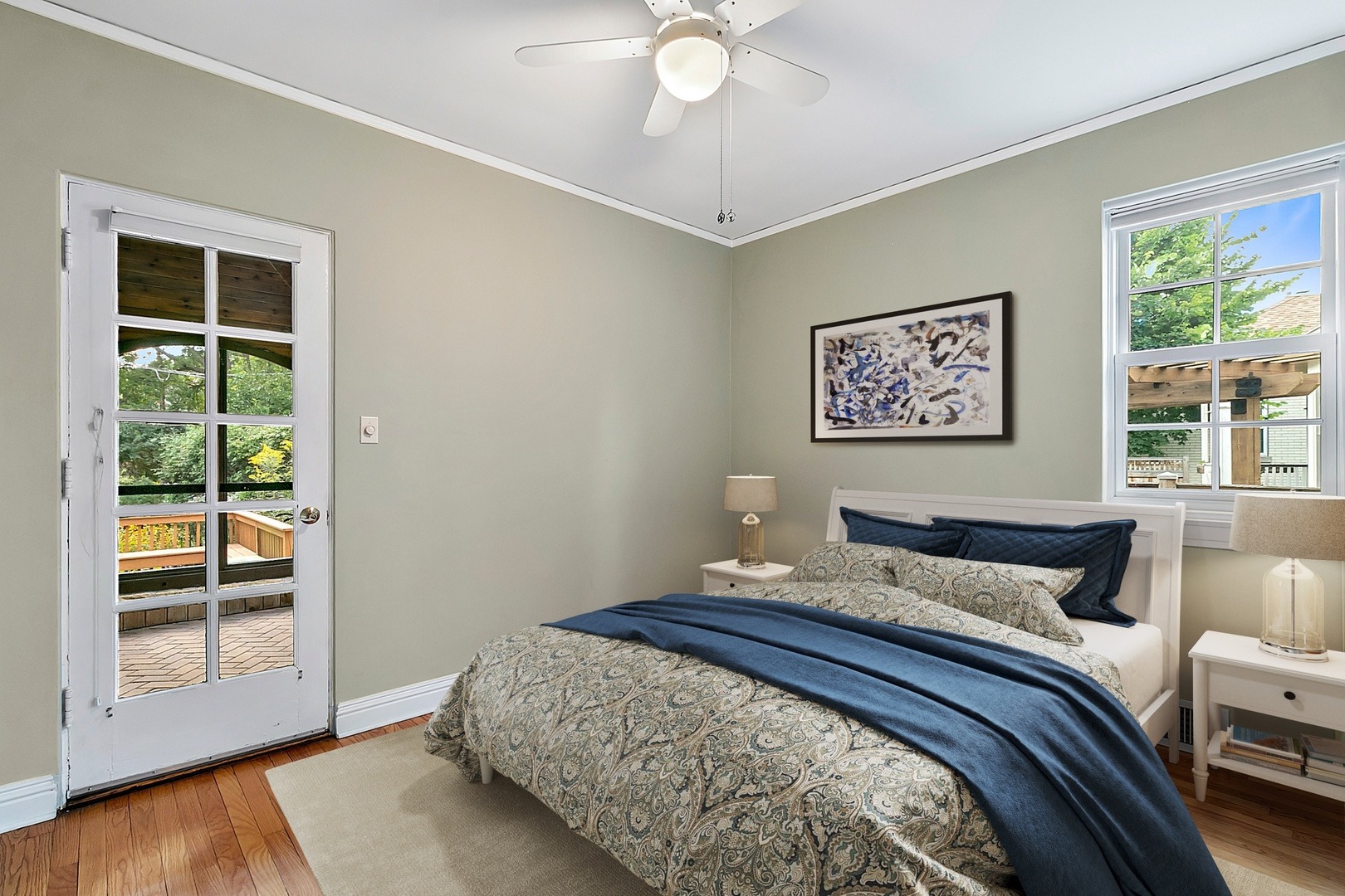 595 Selborne Road Riverside, IL 60546 - Photo 7 of 25 a bedroom with a bed and a large window