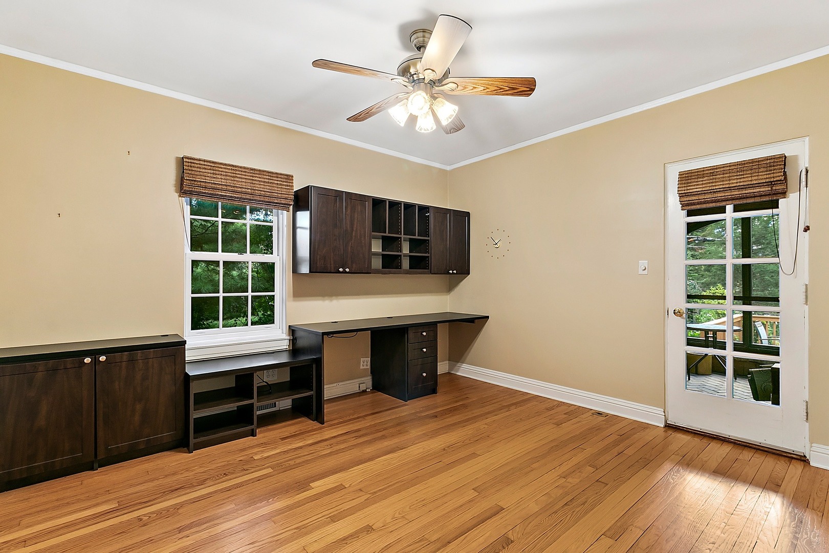 595 Selborne Road Riverside, IL 60546 - Photo 8 of 25 a view of a livingroom with furniture and a ceiling fan