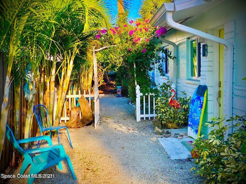411 Audubon Drive Melbourne, FL 32901 - Photo 15 of 47 a view of outdoor space with garden