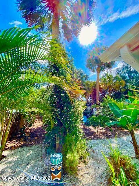 411 Audubon Drive Melbourne, FL 32901 - Photo 18 of 47 a view of a garden