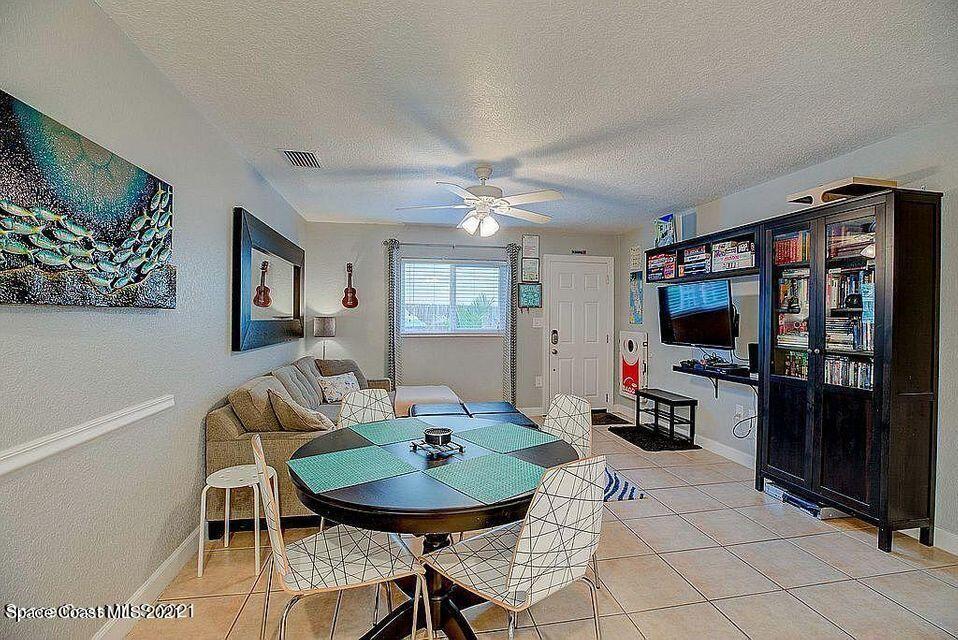 411 Audubon Drive Melbourne, FL 32901 - Photo 32 of 47 a view of a dining room with furniture