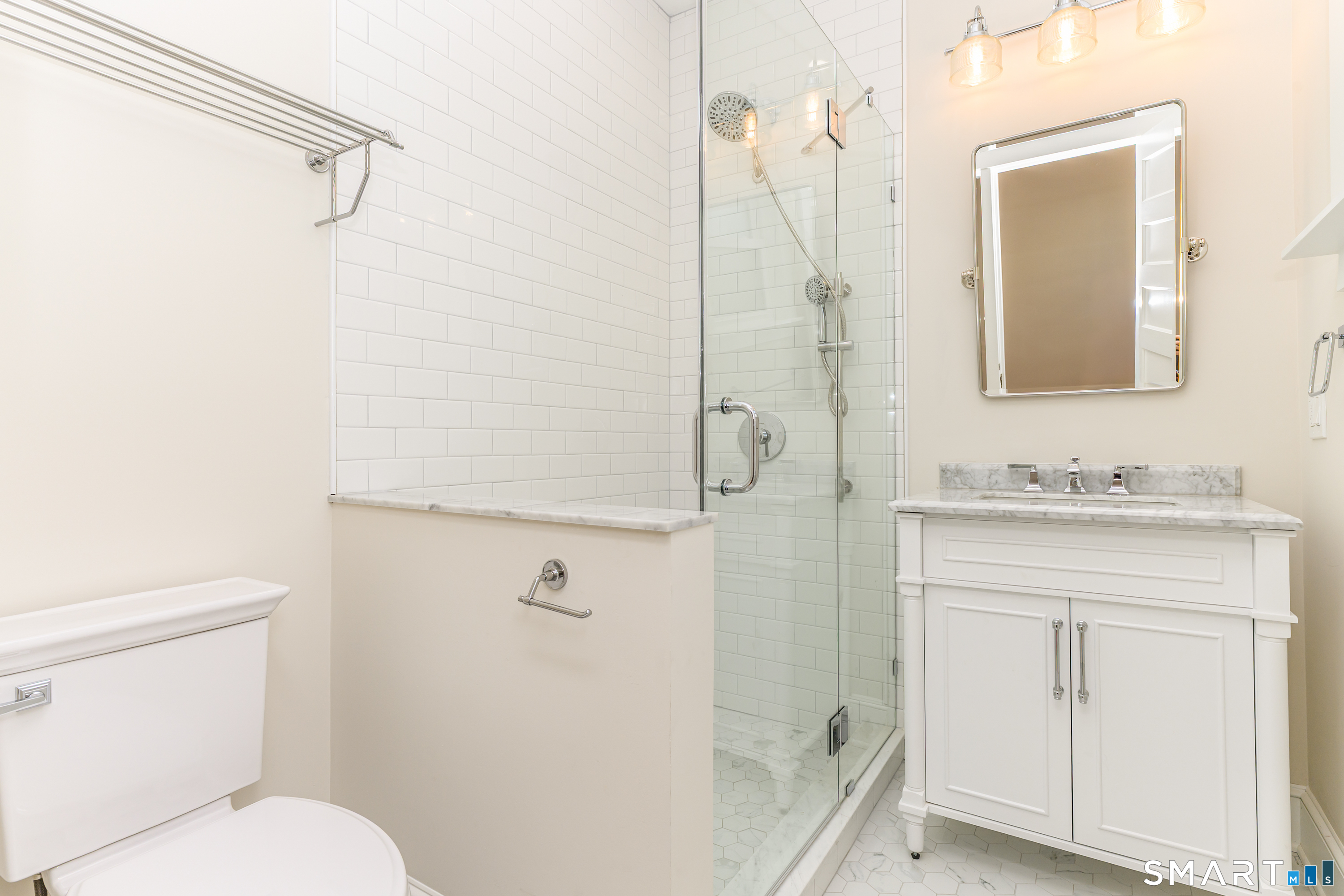 27 Hubinger Street, Unit 2 New Haven, CT 06511 - Photo 30 of 31 a bathroom with a sink a toilet and shower