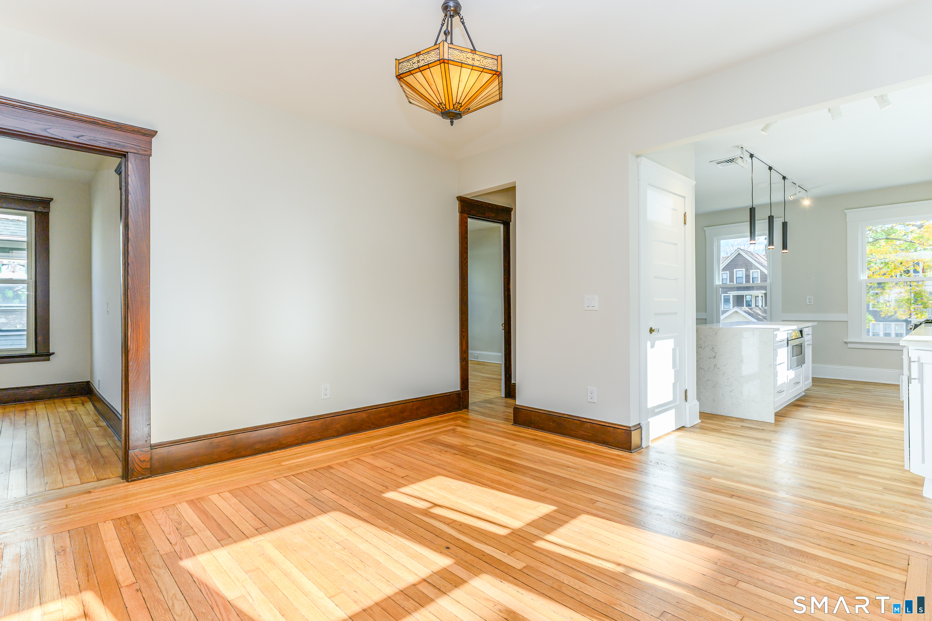 27 Hubinger Street, Unit 2 New Haven, CT 06511 - Photo 8 of 31 a view of a livingroom with wooden floor