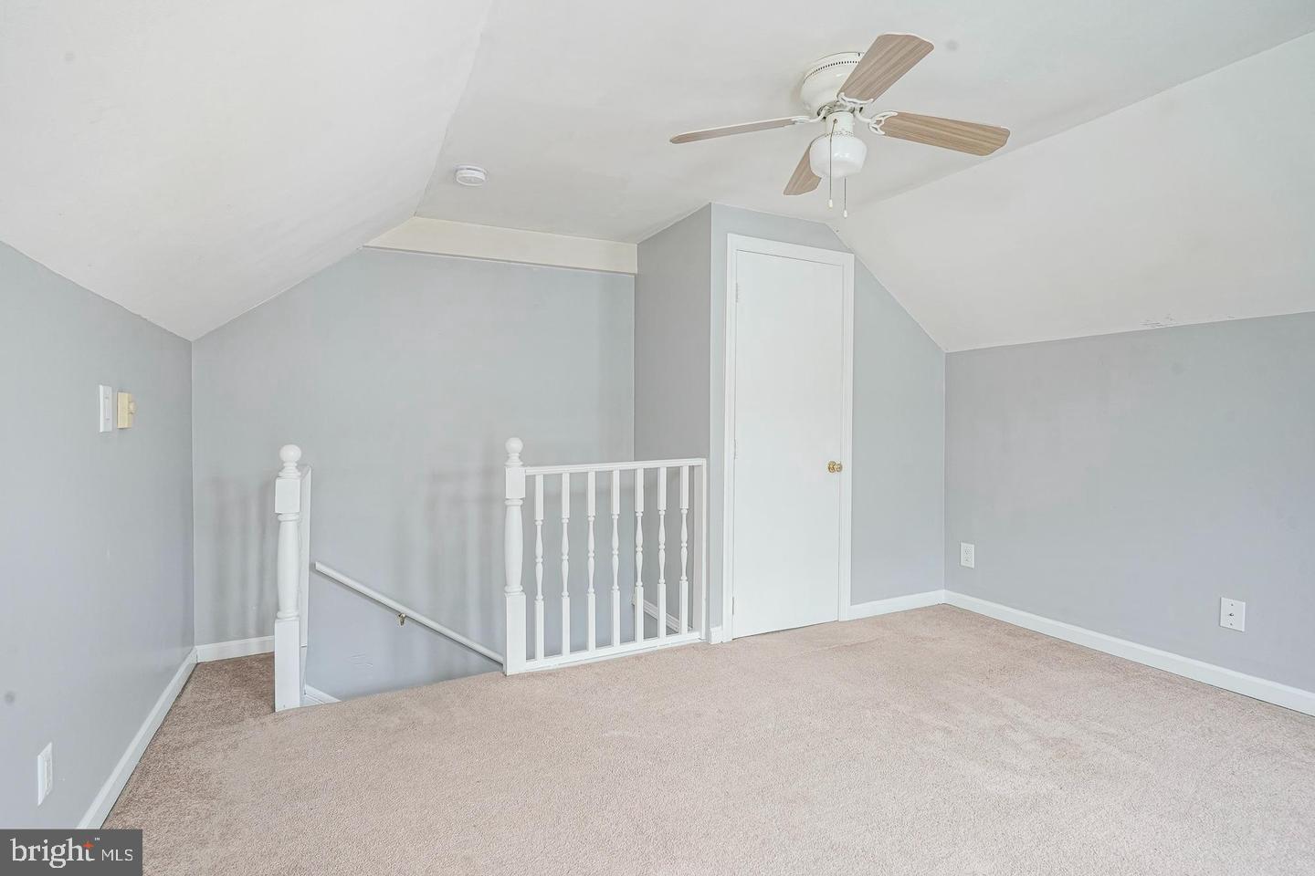 89 Main Street Bridgeport, NJ 08014 - Photo 13 of 15 a view of a livingroom with a ceiling fan and window