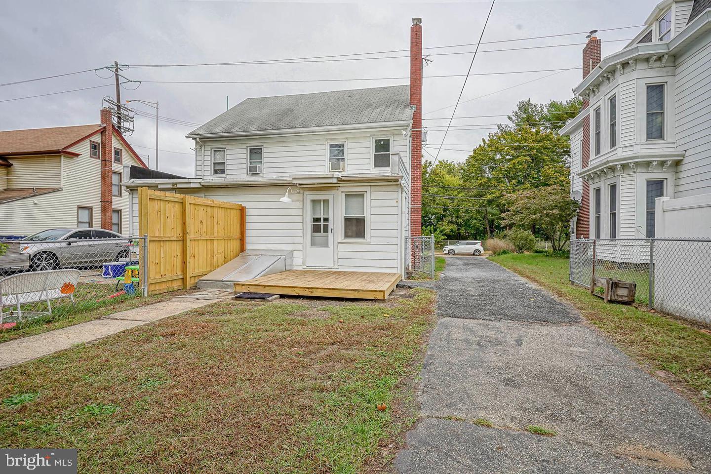 89 Main Street Bridgeport, NJ 08014 - Photo 2 of 15 a view of a house with a street