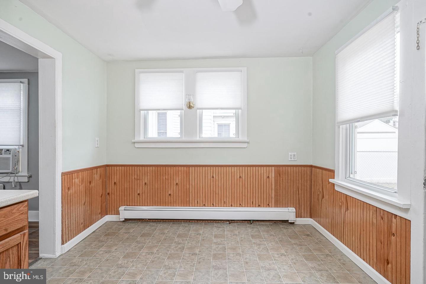 89 Main Street Bridgeport, NJ 08014 - Photo 8 of 15 a view of an empty room with a window