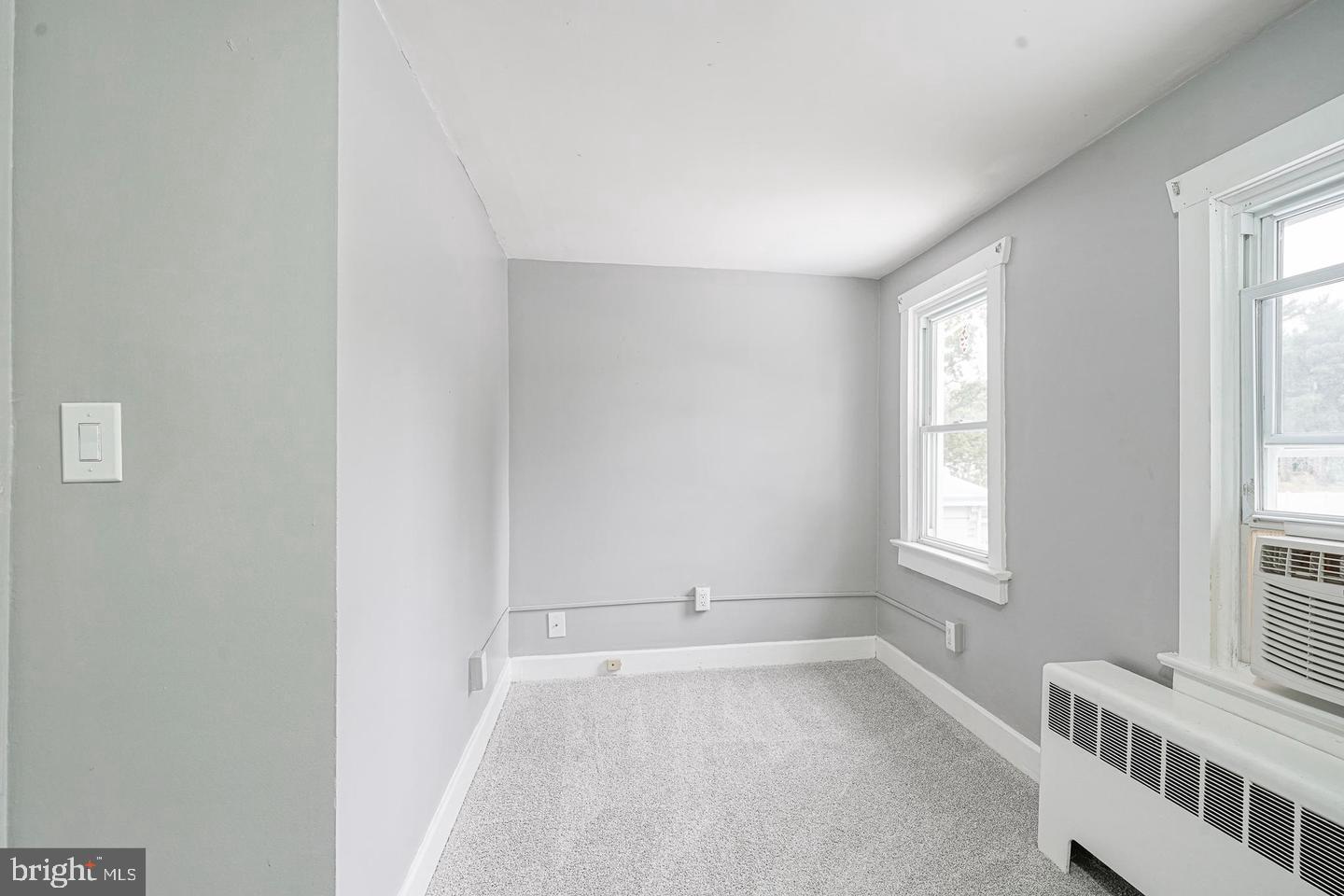 89 Main Street Bridgeport, NJ 08014 - Photo 9 of 15 an empty room with windows