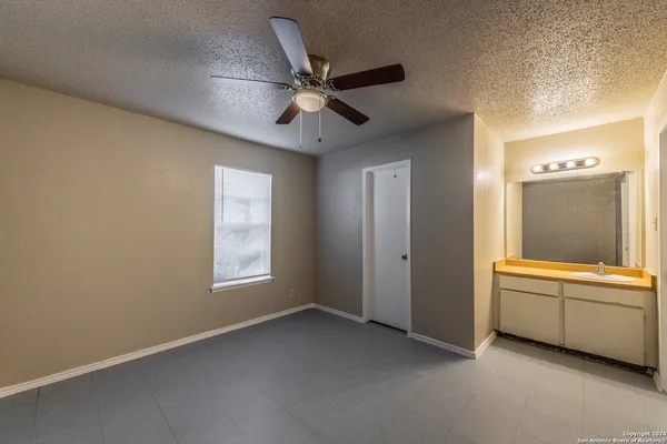 a view of an empty room and window