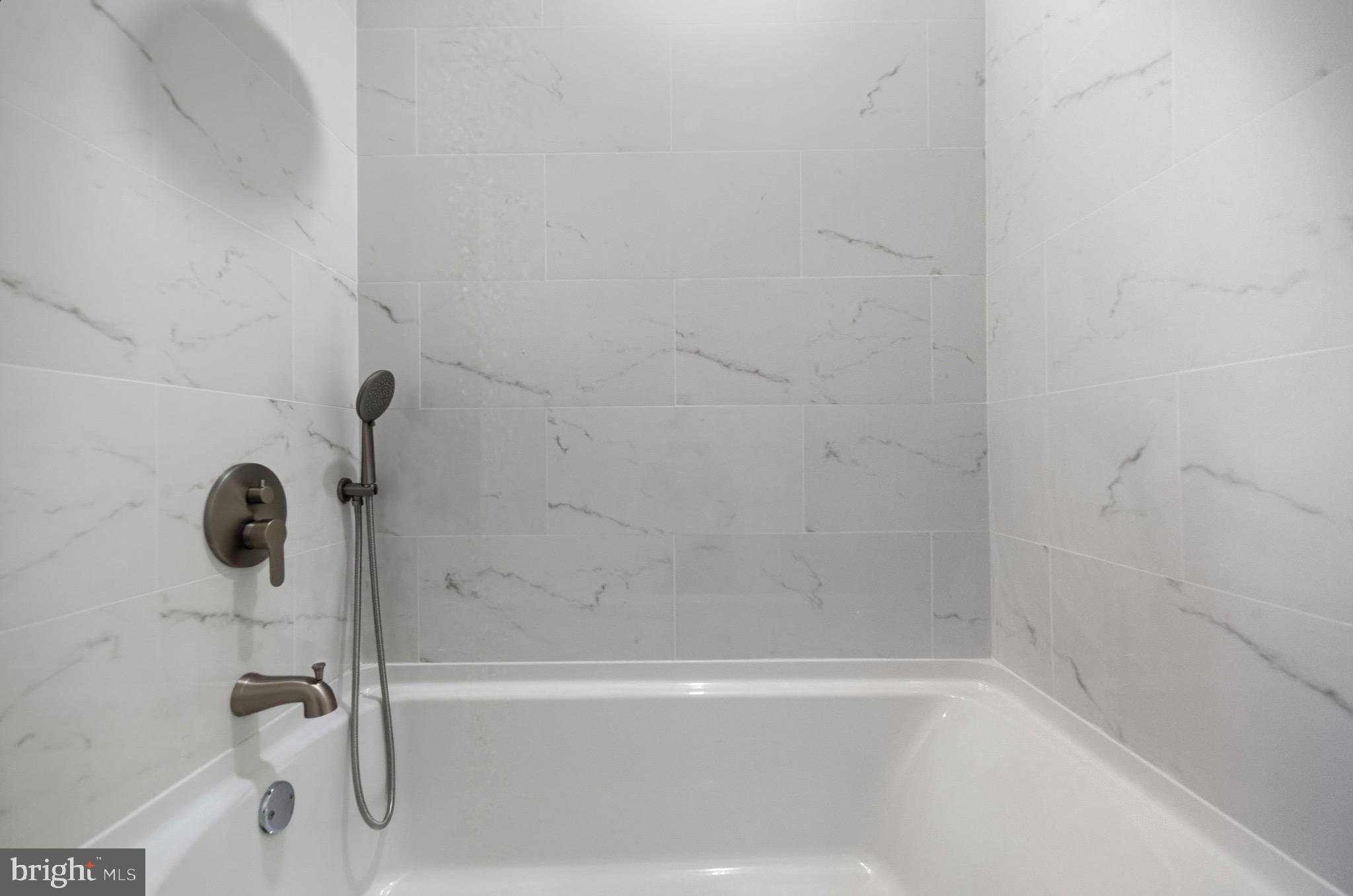 2446 46th Street Pennsauken, NJ 08110 - Photo 15 of 25 a close view of a bathtub in a bathroom