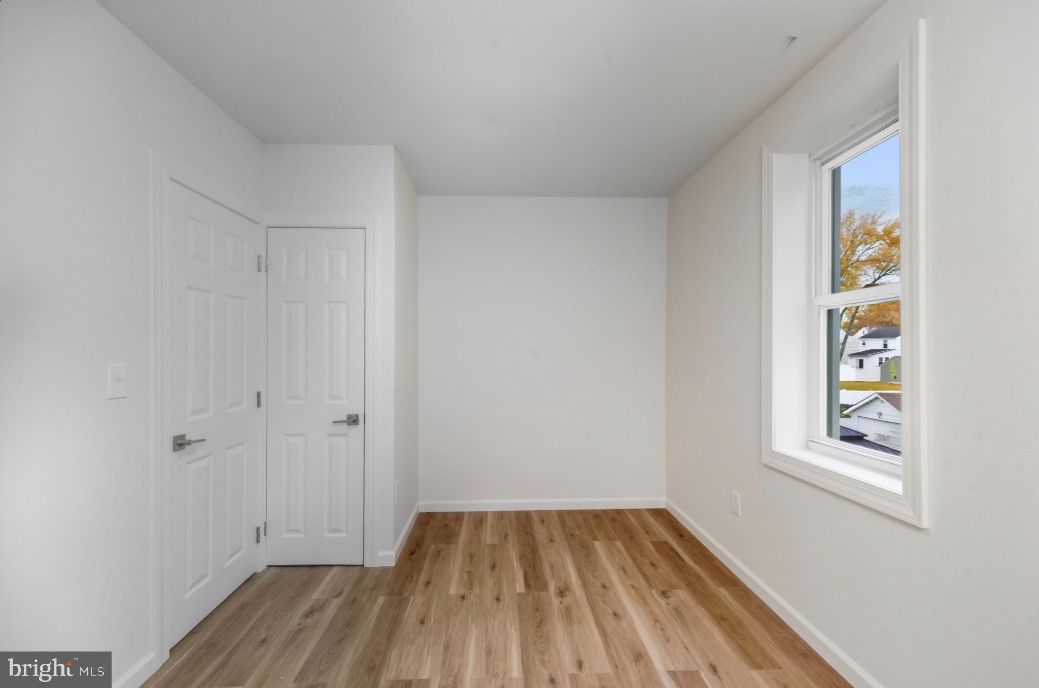 2446 46th Street Pennsauken, NJ 08110 - Photo 20 of 25 a view of a room with wooden floor and small window