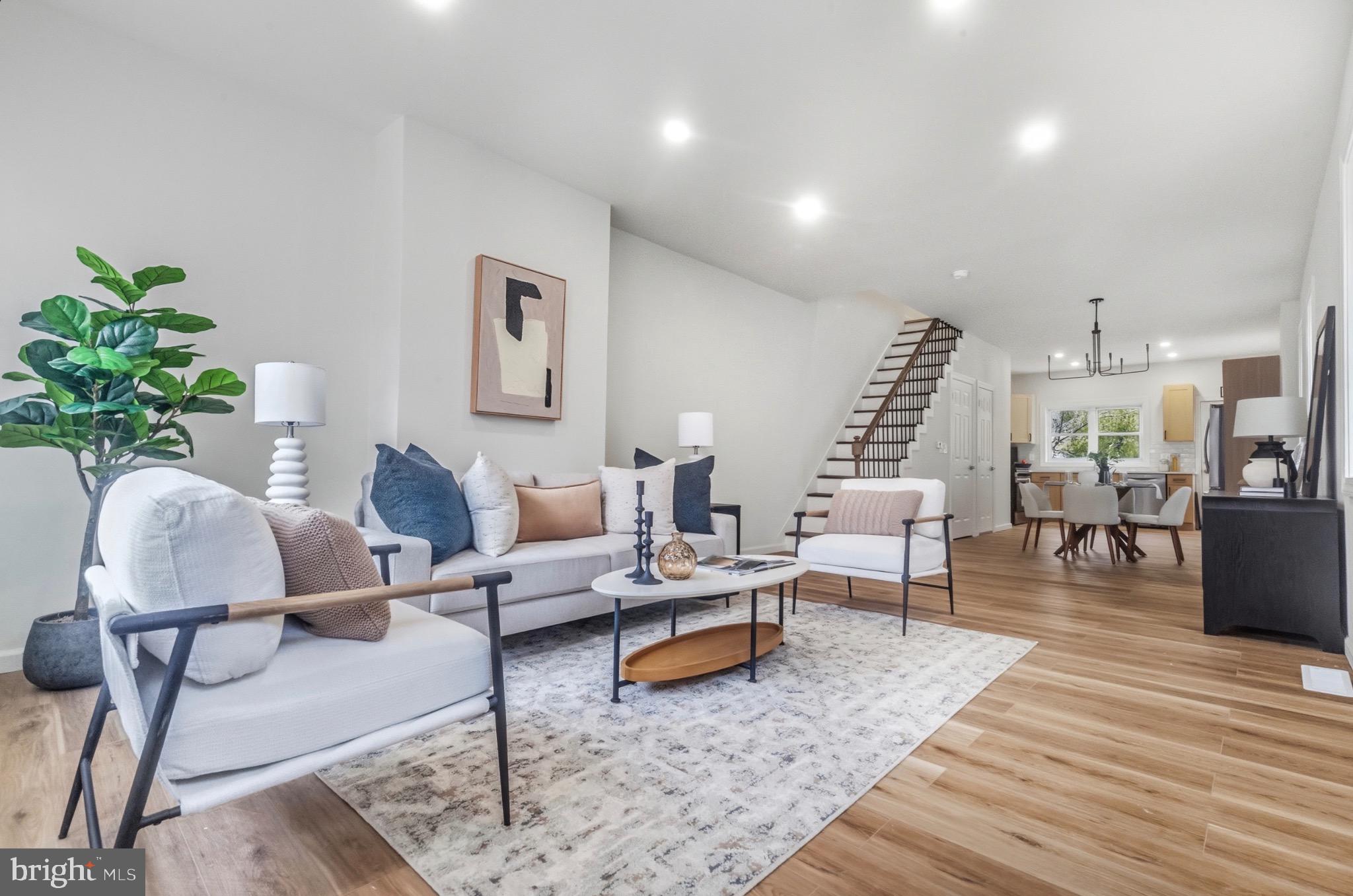 2446 46th Street Pennsauken, NJ 08110 - Photo 3 of 25 a living room with furniture and wooden floor