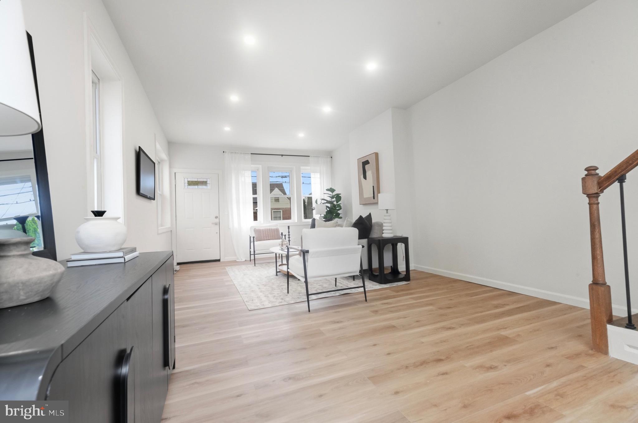 2446 46th Street Pennsauken, NJ 08110 - Photo 5 of 25 a living room with furniture and a wooden floor