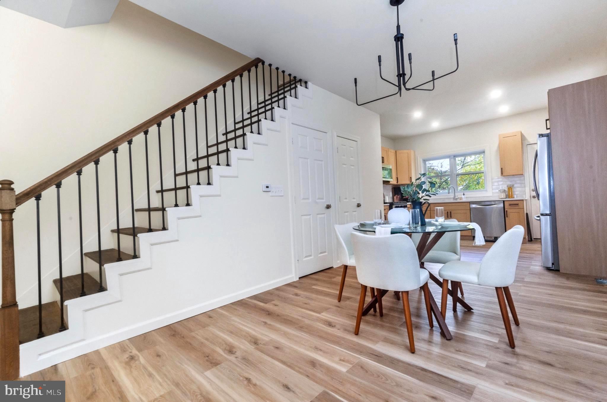 2446 46th Street Pennsauken, NJ 08110 - Photo 6 of 25 a view of a dining room with furniture window and wooden floor