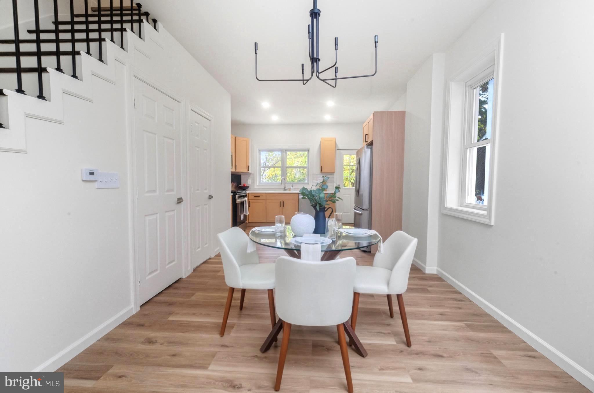 2446 46th Street Pennsauken, NJ 08110 - Photo 7 of 25 a view of a dining room with furniture window and wooden floor