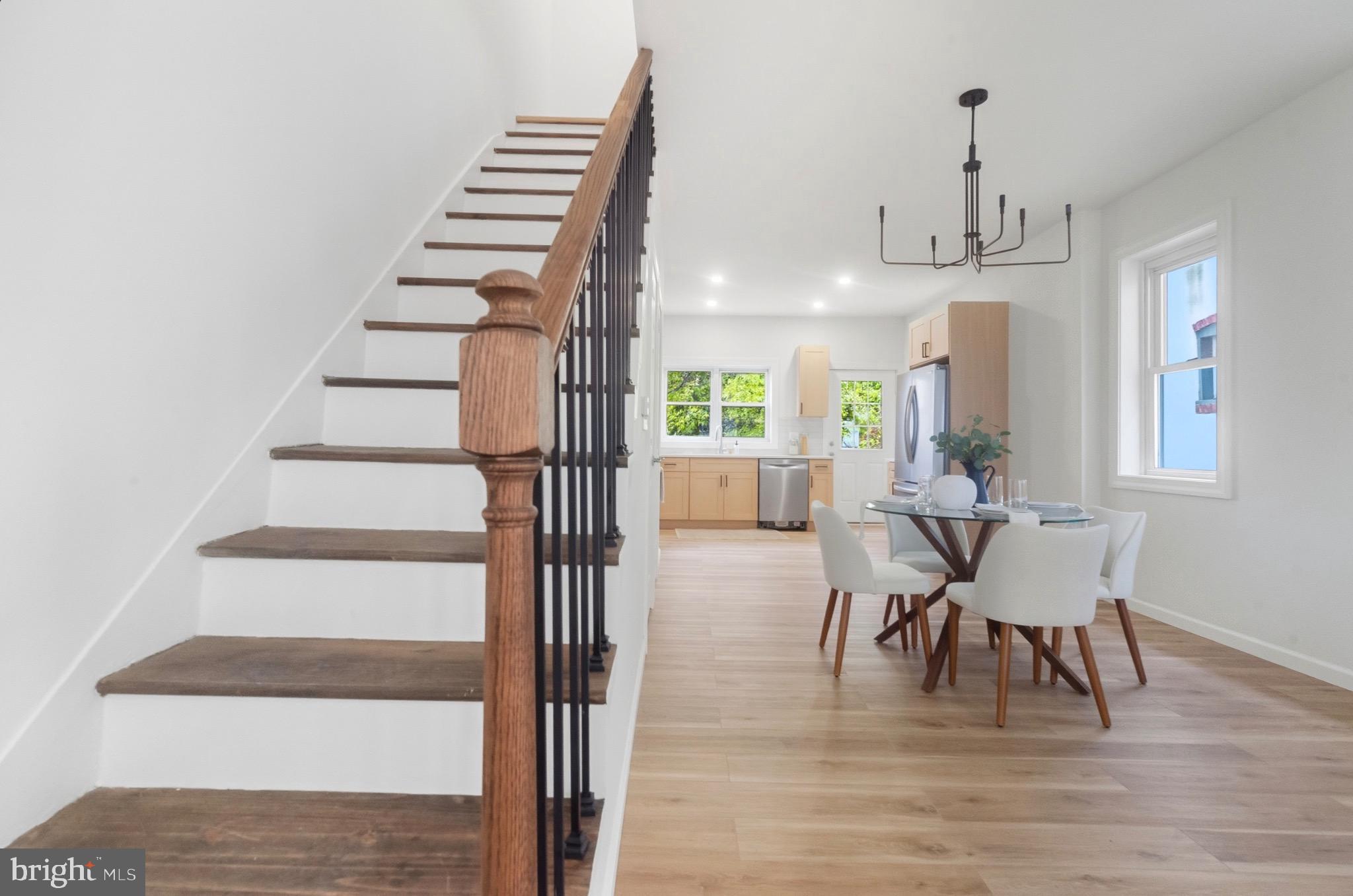 2446 46th Street Pennsauken, NJ 08110 - Photo 8 of 25 a view of a dining room with furniture and wooden floor