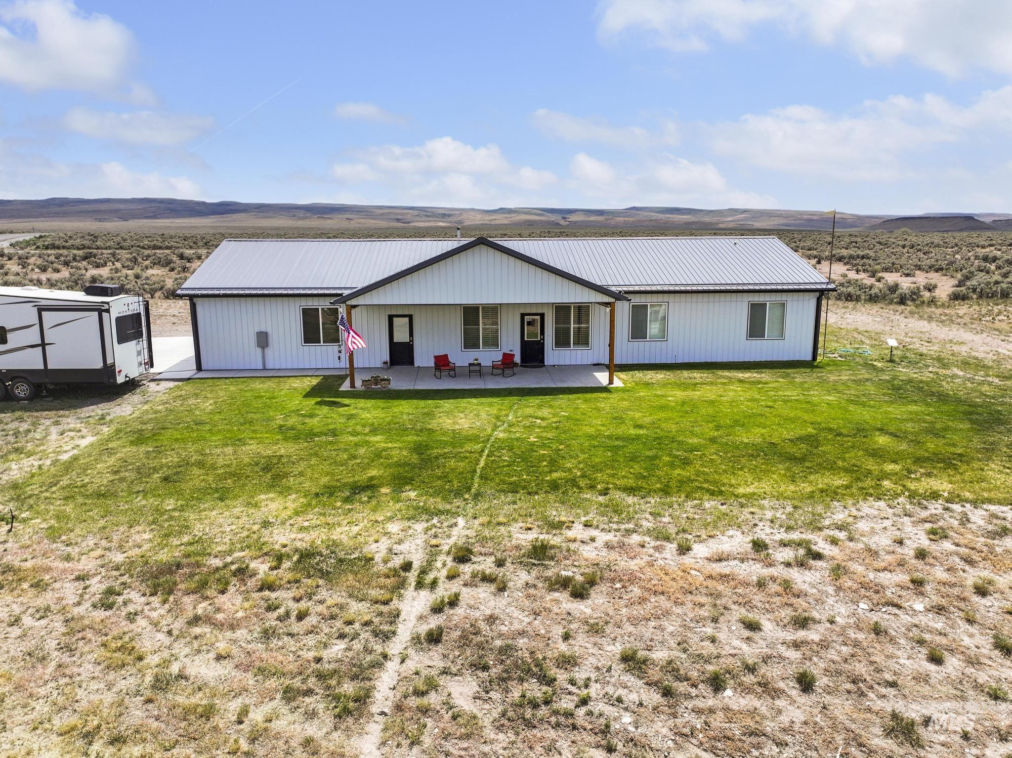 758 Cedar Crk Road Rogerson, ID 83302 - Photo 41 of 50 Contemporary single-story residence featuring a white facade and a metal roof
