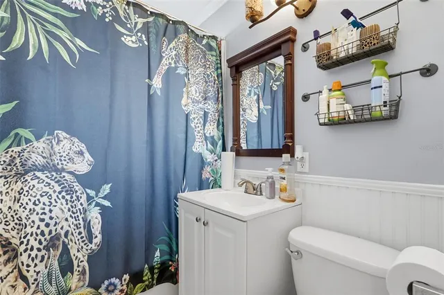 a bedroom with bed and a window