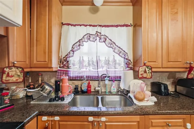 a view of storage and utility room with washer and dryer